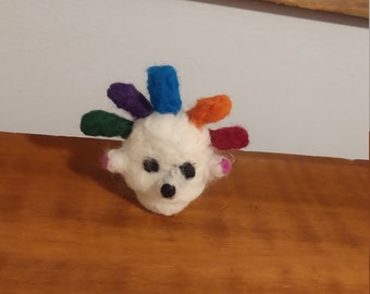 Squeaking squeakoid felt doll