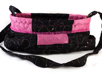 Evening bag in black and pink with a  lovely lace and a zipper. Made of embroidered taffeta