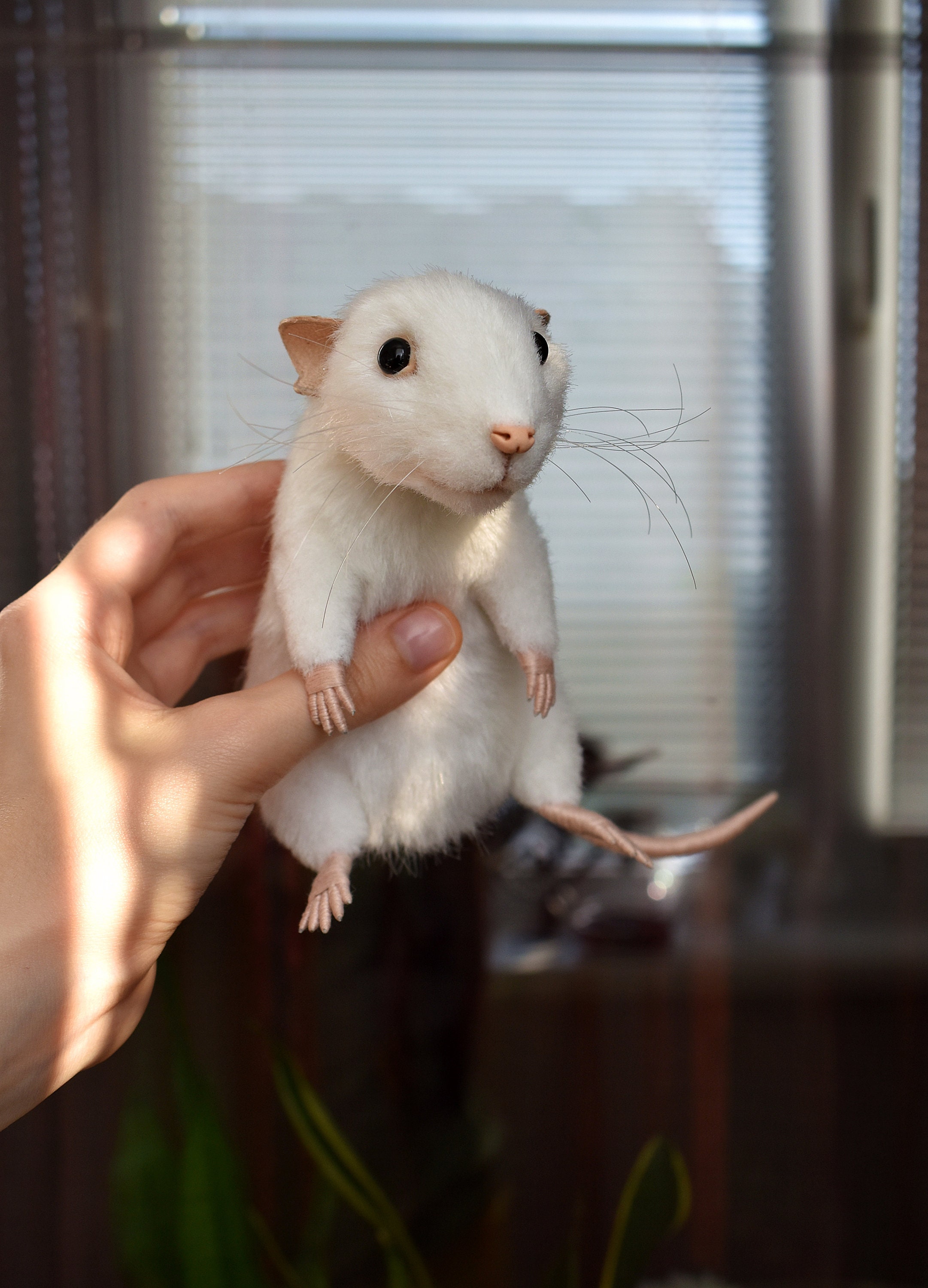 Handmade toy made of polymer clay white rat symbol of 2020 Stock