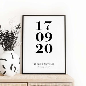 May include: Black and white framed print with the date "17 09 20" and the text "Steve & Natalie The day we met".
