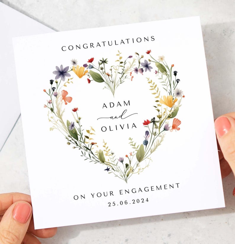 A greeting card for engagement with a floral heart design and the text Congratulations  on your engagement