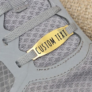 Tag shoe laces custom engraved. Shoe lace charm personalized. Metal locks wholesale gift. Message connectors gift runners clips sneakers