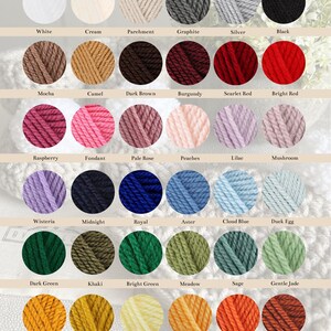 May include: A color chart of wool yarn options, featuring a variety of shades. The chart includes colors like white, cream, black, red, blue, green, and yellow. The text "WOOL COLOURS OPTIONS" is at the top.