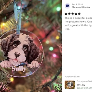 a dog ornament hanging from a christmas tree