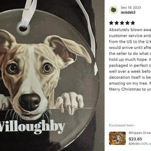 a picture of a dog on a glass ornament