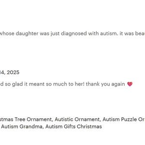 The image is a screenshot of a social media post featuring a review of a gift for a co-worker with a daughter who has been Diagnosed with Autism. The review is written by a contact buyer, Amy, who responds to the gift on February 14, 2015. The review expresses gratitude for the thoughtful gift and mentions that it meant a lot to her. The image also includes a description of an Autism Christmas Tree Ornament, Autism Puzzle Ornament, Autism Mom, Autism Grandma, and Autism Gifts Christmas.
