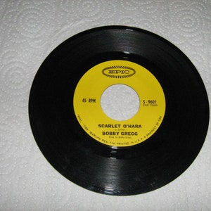 1950s pop rock 45 rpm Bobby Gregg  on epic # 5-9601  (  scarlet o&#39;hara ) flip side is ( take me out to the ball game )