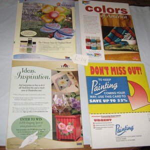 May include: Four magazine pages featuring painting supplies and instructions. The first page shows a colourful flower painted on a wooden surface with the text "Outdoor Colorful Creations Outdoors!" The second page shows a painting of a blanket with the text "Colors of America". The third page shows a painting of a flower in a glass vase with the text "Ideas. Inspiration." The fourth page shows a yellow and red sign with the text "Don't Miss Out! To Keep Painting Coming Your Way, Use This Card To Save Up To 33%"