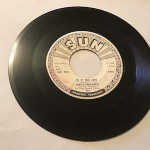 Tracy Pendarvis  rock & roll promo 45 record on Sun # 335 ( a thousand guitars ) flip side is ( is it to late )