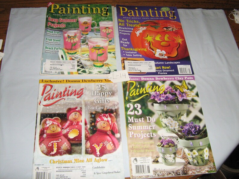 May include: Four issues of Painting magazine featuring various craft projects. The covers feature a pumpkin, a snowman, a Christmas mouse, and a flower pot.