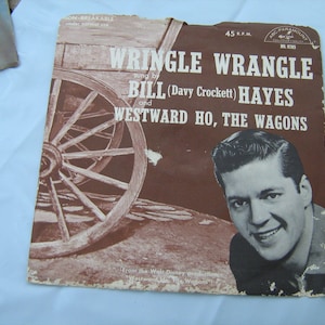 1950s early country Bill Hayes 45 rpm with paper picture sleeve ( westward ho the wagons ) flip side is ( wringle wrangle) ABC #45-9785