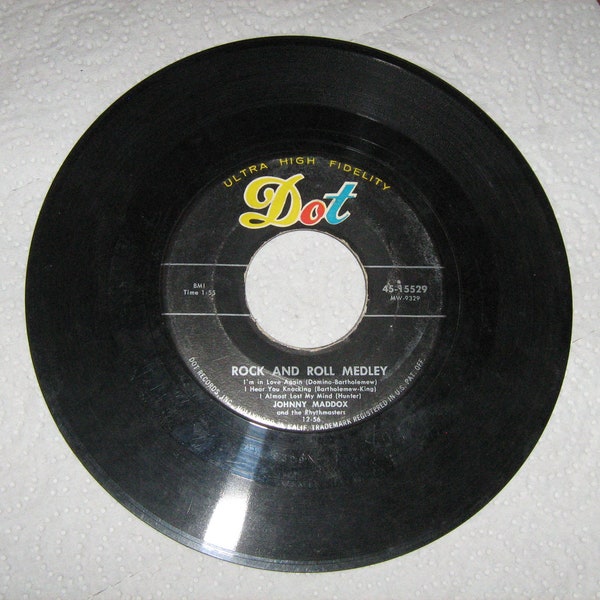 1960s 45 rpm rock Johnny Maddox on dot # 45-15529  ( mood indigo ) flip side is ( rock and roll medley )