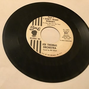 Joe Thomas Orchestra Jazz D J copy45 rpm record on Sue # 807 ( I don’t want nobody part 1 ) flip side is part 2