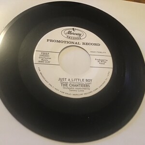 The Chanteers 45 rpm promo record on mercury # 72037 ( just sA little boy ) flip side is (I waited )