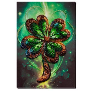 May include: A green four-leaf clover made of sparkling beads on a dark green background with a sparkly glow.