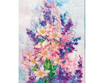 May include: A close-up of a beaded art piece depicting a bouquet of pink lilies and purple flowers. The background is a light blue watercolour wash.