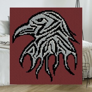 May include: A black and white pixelated image of a stylized eagle head with a red background.
