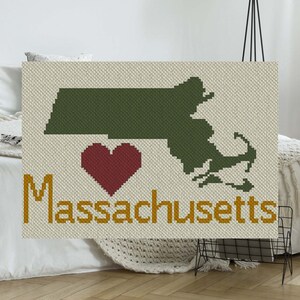 May include: A green outline of the state of Massachusetts with a red heart and the text "Massachusetts" in gold.