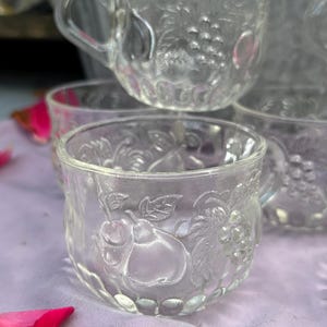 May include: A handmade wooden sign with the text "Welcome" in a playful font. The sign features a distressed white background and a dark brown frame, suitable for indoor or outdoor use.