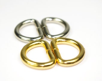 2x D-rings 15 mm/silver-brass colored