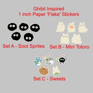 May include: Ghibli-inspired paper flake stickers. Set A features black Soot Sprites. Set B includes Mini Totoro characters. Set C showcases Sweets designs. Each sticker is approximately 2.5 cm in size.