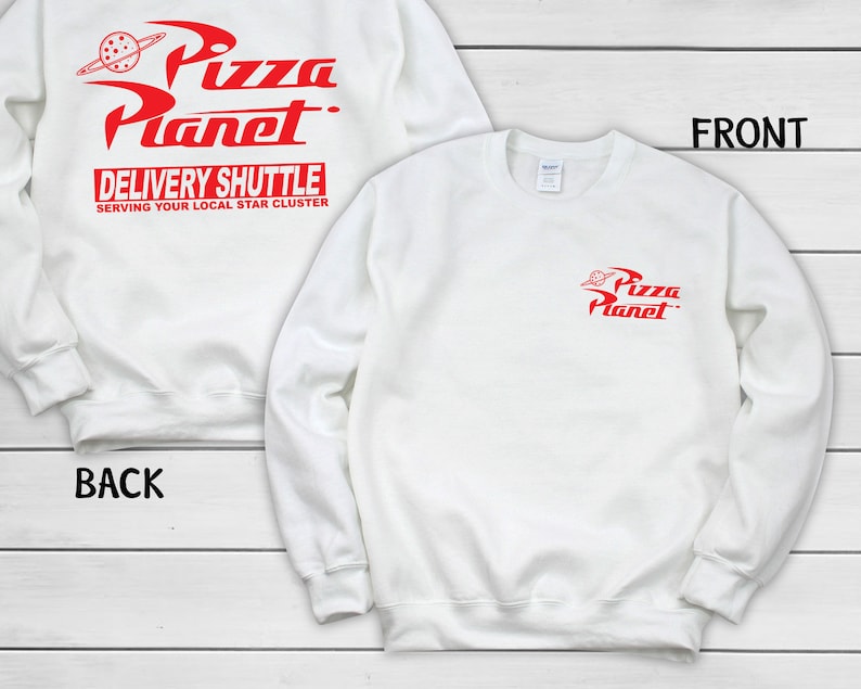 May include: White sweatshirt with red "Pizza Planet" logo and text. The front features a small logo, while the back displays the full logo with "Delivery Shuttle" and "Serving Your Local Star Cluster."
