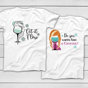 May include: Two white t-shirts with cocktail-themed graphics. One shirt features a wine glass with the text "Let it Flow" and snowflakes. The other shirt has a character with the text "Do you wanna have A COCKTAIL?" and snowflakes.