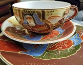 Satsuma teacups, saucers and dessert plates. Set of 6. These 1920s era Moriage pieces feature a lithopane in each cup of a geisha girl.