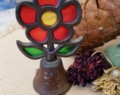 Set of Rusty cast iron stained glass look flower bell and butterfly window hanging. Coupling the rusty iron and the brilliant colors- yum