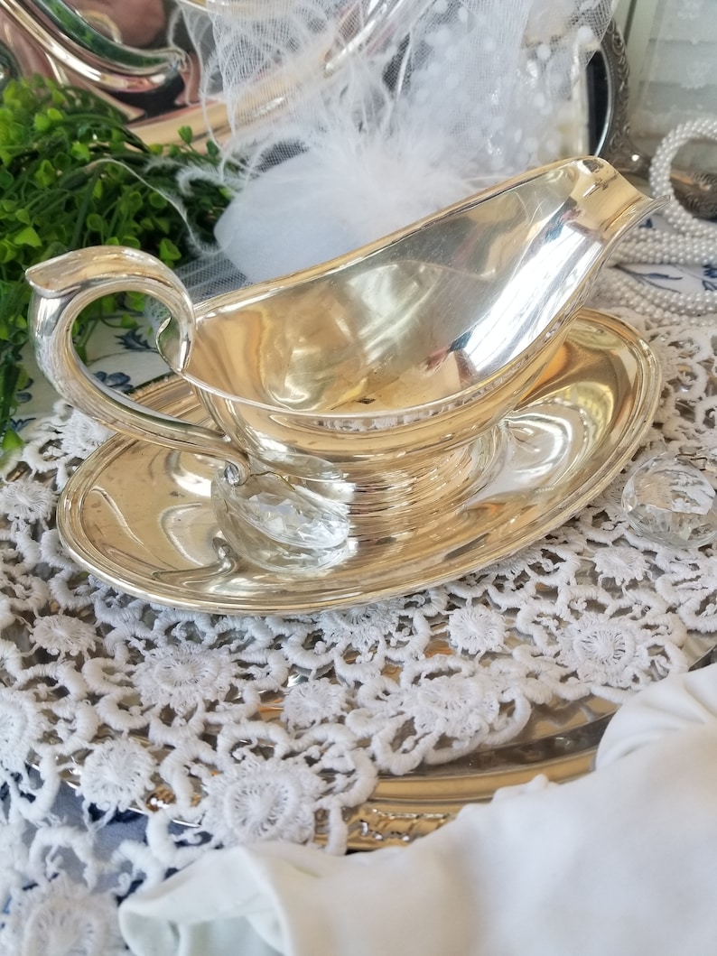 Gorgeous and gleaming Gorham silver plated sauce boat. This elegant silver plated gravy boat has an attached plate beneath. image 3