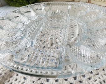 Absolutely gorgeous mid-century Indiana glass deviled egg tray. This sparkling clear glass deviled egg & relish tray has a pineapple motif.