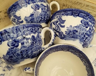 Beautiful antique Blue Willow tea cups. This set of 4 transferware blue willow teacups could be proudly displayed in any China hutch.