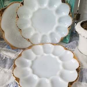 Absolutely gorgeous vintage gold gilded white milkglass egg plate. This vintage milkglass deviled egg tray is epic farm table decor!
