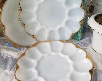 Absolutely gorgeous vintage gold gilded white milkglass deviled egg tray. This vintage milkglass deviled egg tray is epic farm table decor!
