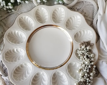 Beautiful gold gilded cream colored Lenox deviled egg tray. This breathtaking Lenox porcelain egg tray will elevate your tablescape.