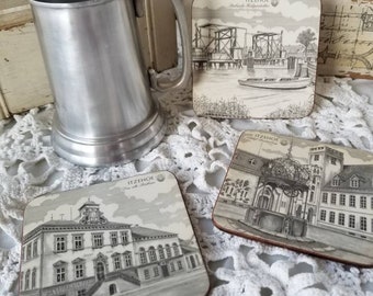 Stylish set of 3 vintage Pimpernel cork back coasters. These delightful Pimpernel coasters are drawings of the Northern German Town, Itzehoe