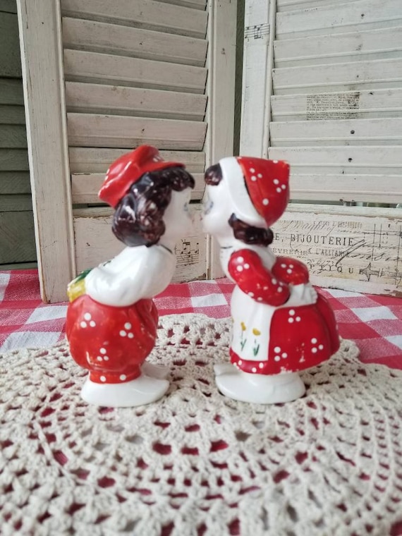 Adorable Painted Ceramic Kissing Dutch Children Couple. These