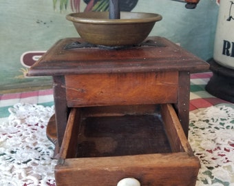 Antique hand crank burr coffee grinder. This rustic wooden coffee grinder will look fabulous in your Farmhouse kitchen or cabin.