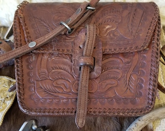 Vintage hand tooled leather purse is the perfect cowgirl bag. This vintage 70s  leather  is Epic Bohemian Western Wear.