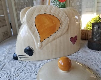 Adorable stitched mouse cookie jar. This 1960s ceramic cookie jar is sweet jar to fill with  Grandma's chocolate chip cookies.
