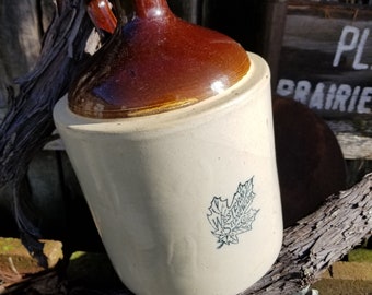 Little Brown Jug as the song would say. This primitive Western stoneware Moonshiners jug will really add to a rustic Farmhouse vignette.