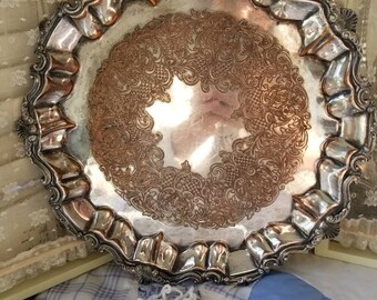 Breathtakingly beautiful silver plated serving tray. This gorgeous silver plated copper tray is worthy of even the finest table setting.