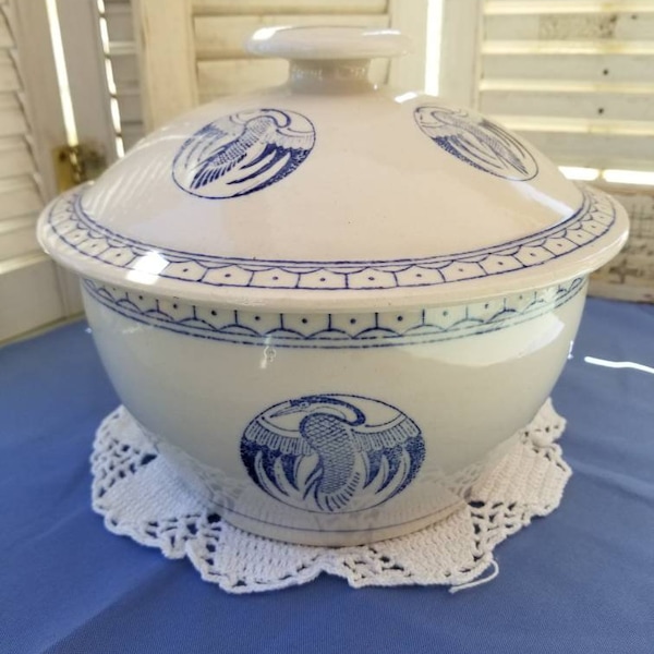 Phenomenal large earthenware Chinese rice bowl with lid. This heavy blue and white Pottery Rice Bowl has traditional flying crane pattern.