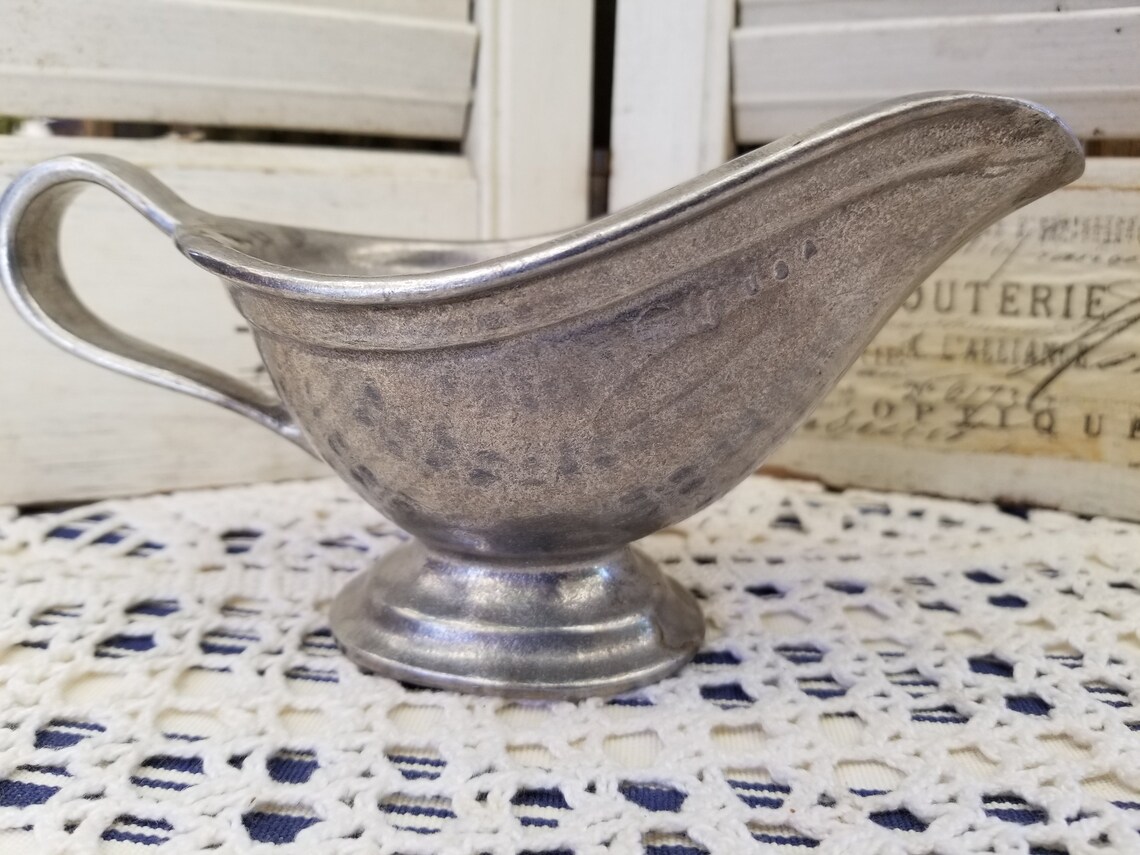Spectacular primitive pewter gravy boat. This colonial style Etsy