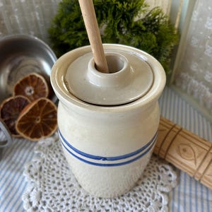 Beautiful blue striped small pottery butter churn. This delightful antique butter crock churn belongs in your farmhouse kitchen.