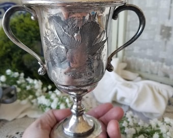 Selection of three silver and pewter diminutive trophy vessels. You choose which of these delightful trophy Style urns to Adorn your home.