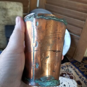 Delicious Rustic and patinated hand rot copper cup. This antique copper vessel is loaded with rustic French country Farmhouse charm.