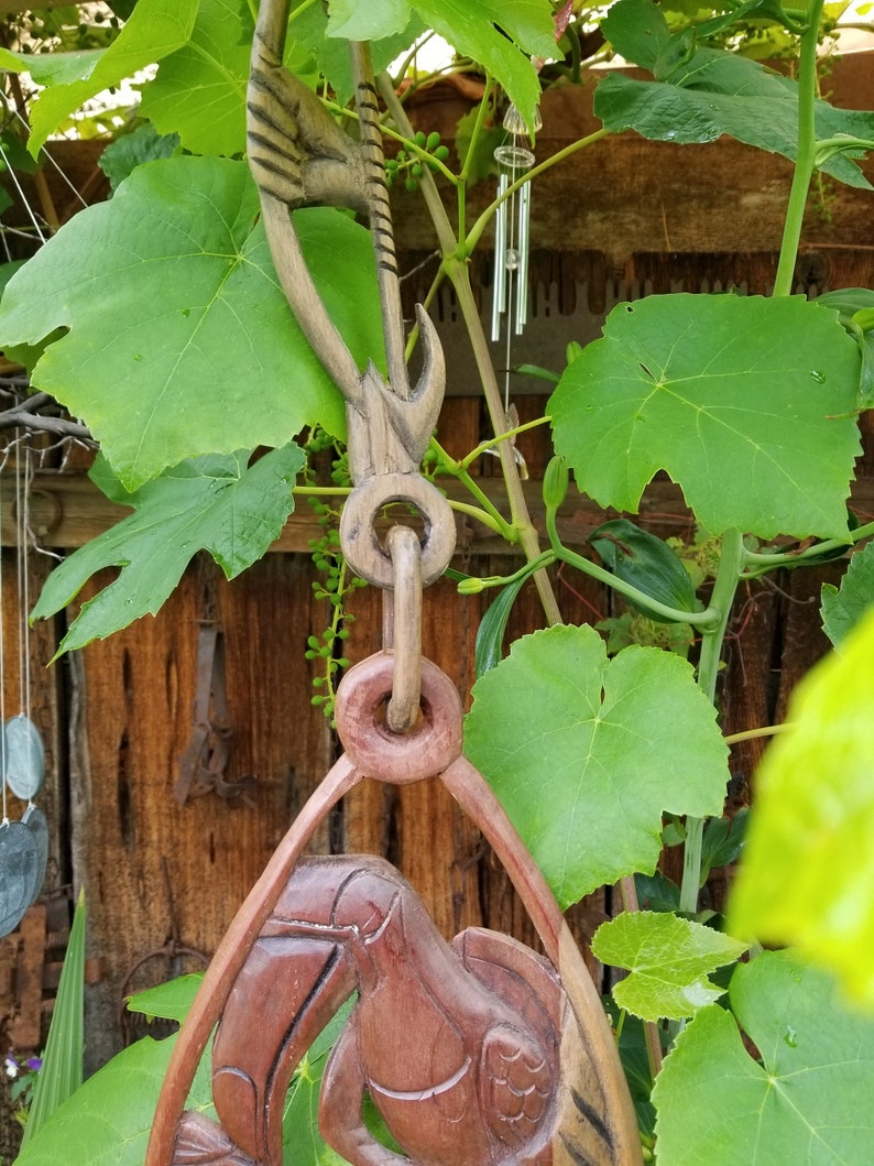 Beautifully hand-carved tropical themed wall hanging Ideal for a jungle or Tiki Room This 3 piece wall hanging features a toucan and fish