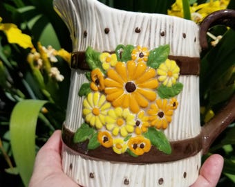 Adorable vintage countey ceramic pitcher. This sweet handpainted farmhouse Pottery pitcher is perfect for your garden blooms.