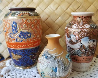 Selection of 3 intriguing hand-painted vintage Oriental vases. Each has been done with tactile texture making for great interest and feel.